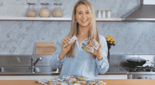 woman holding snack bars
